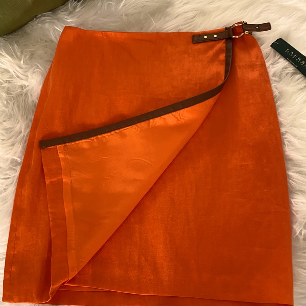 Brand new with tag 100% linen Ralph Lauren skirt. Adjustable to sizes 4- 8.